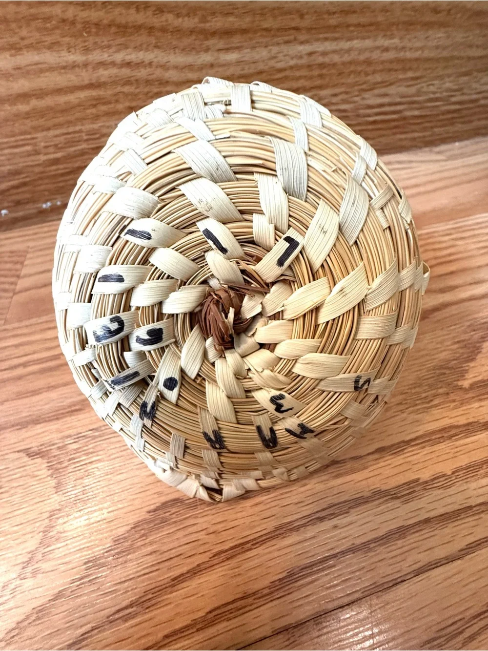 Atraditional hand-woven sweetgrass basket